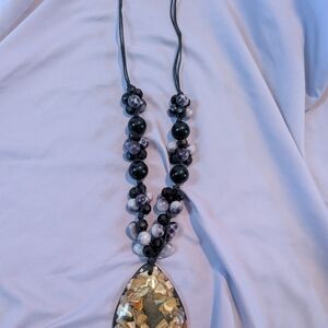 Elegant Black and Gold Pendant Necklace